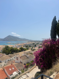 image of a village in Spain overlooking the mediterranean on an international trip