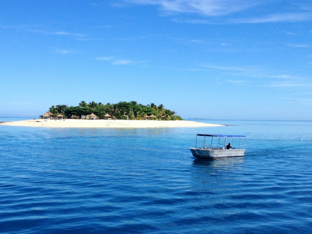 a boat near a small island in Fiji