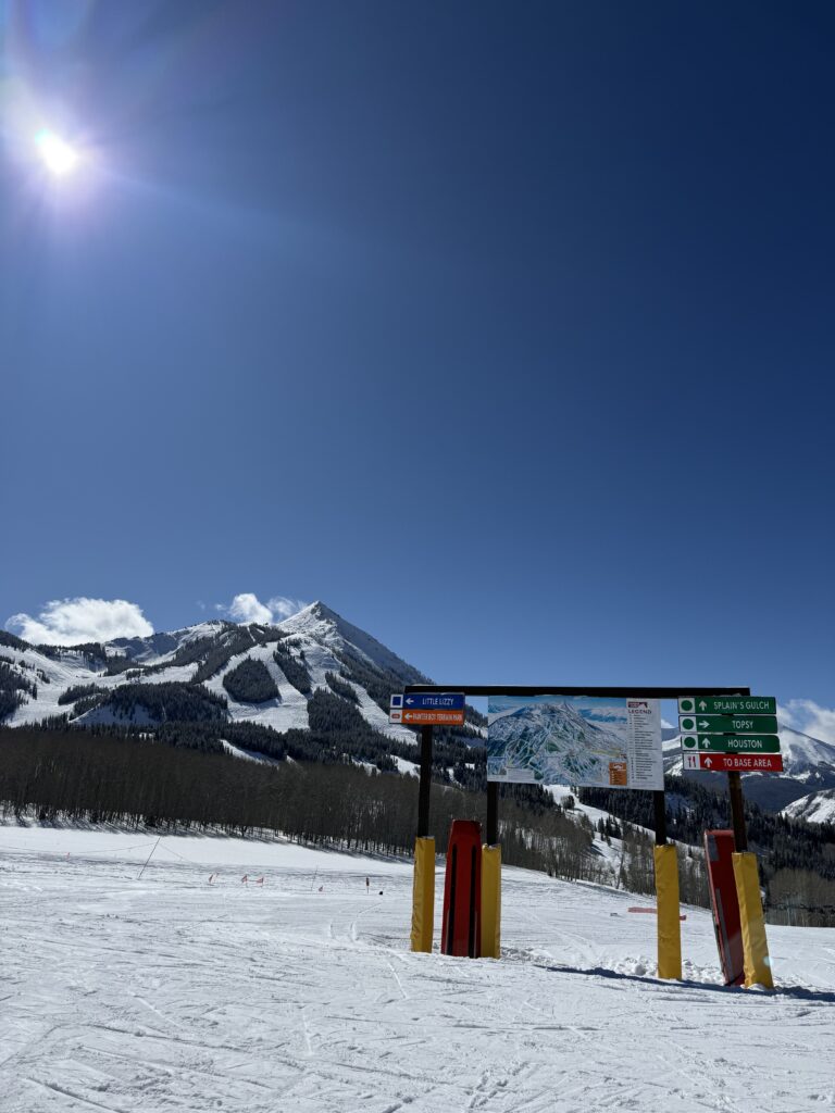 Ski signage on a blue sunny day in Crested Butte, Colorado