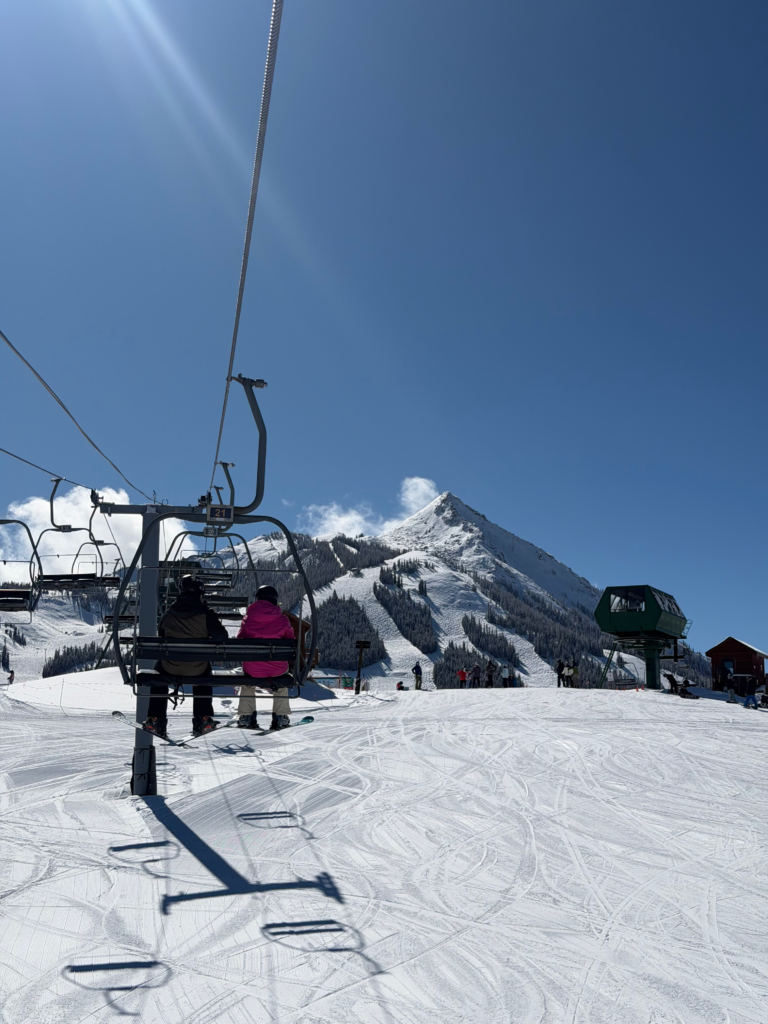 A couple on a chairlift together in Crested Butte, Colorado.