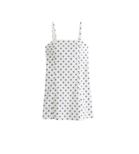 White bra-free polka dot mini dress outfit idea.